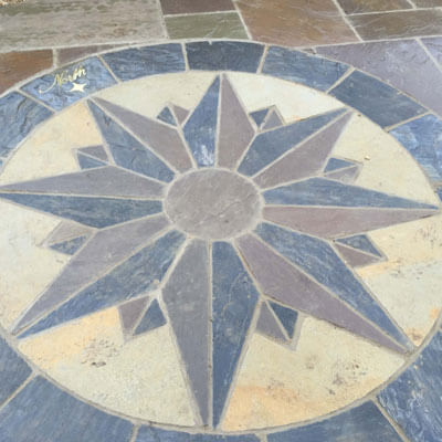 artistic paving on patio in gloucestershire