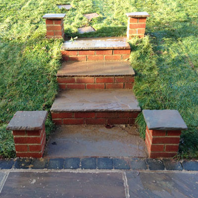 small brick step feature in gloucestershire garden